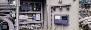 Blur background of power electricity control panel on factory site, Electrical switch cabinet, Main substation with breaker to control automatic system of machine