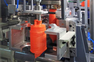 formation of plastic cans in the mold