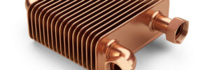 Copper heat exchanger with tubes for connection of Industrial cooling unit equipment. 3d illustration isolated on a white bacground.