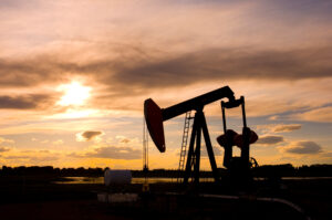 Pump Jack Silhouette at Sunset