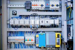 Electrical control panel metal shield energy distribution for CNC machine with controllers automats.