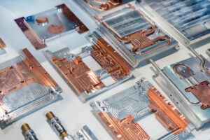 Aluminum-copper heat sink plates for industrial electronics. Equipment for cooling electronic components.